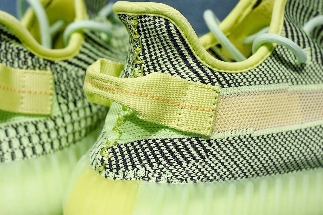 c7e4419f-adidasYeezyBoost350V2Yeezreel_Non-Reflective_8_d1312011-50bf-41a4-b1cf-8b084517631c.jpg